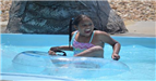 Big smile on girl in lazy river