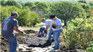 Westar volunteers add rock to trail